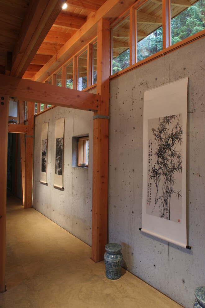 This is an example of a contemporary hallway in Vancouver with grey walls.