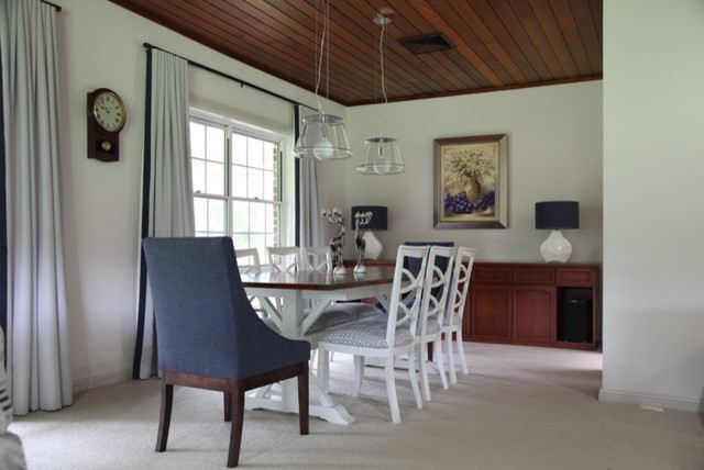 Design ideas for a large contemporary dining room in Sydney with white walls and carpet.