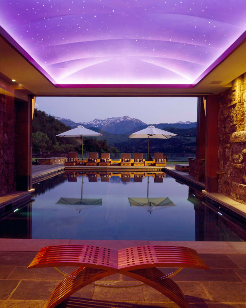 Mountain style pool photo in Denver