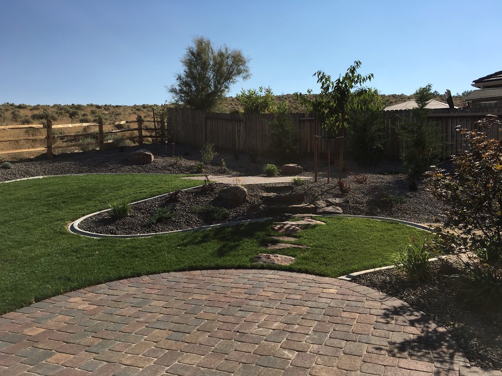 Mid-sized traditional backyard patio in Las Vegas with brick pavers, a container garden and no cover.