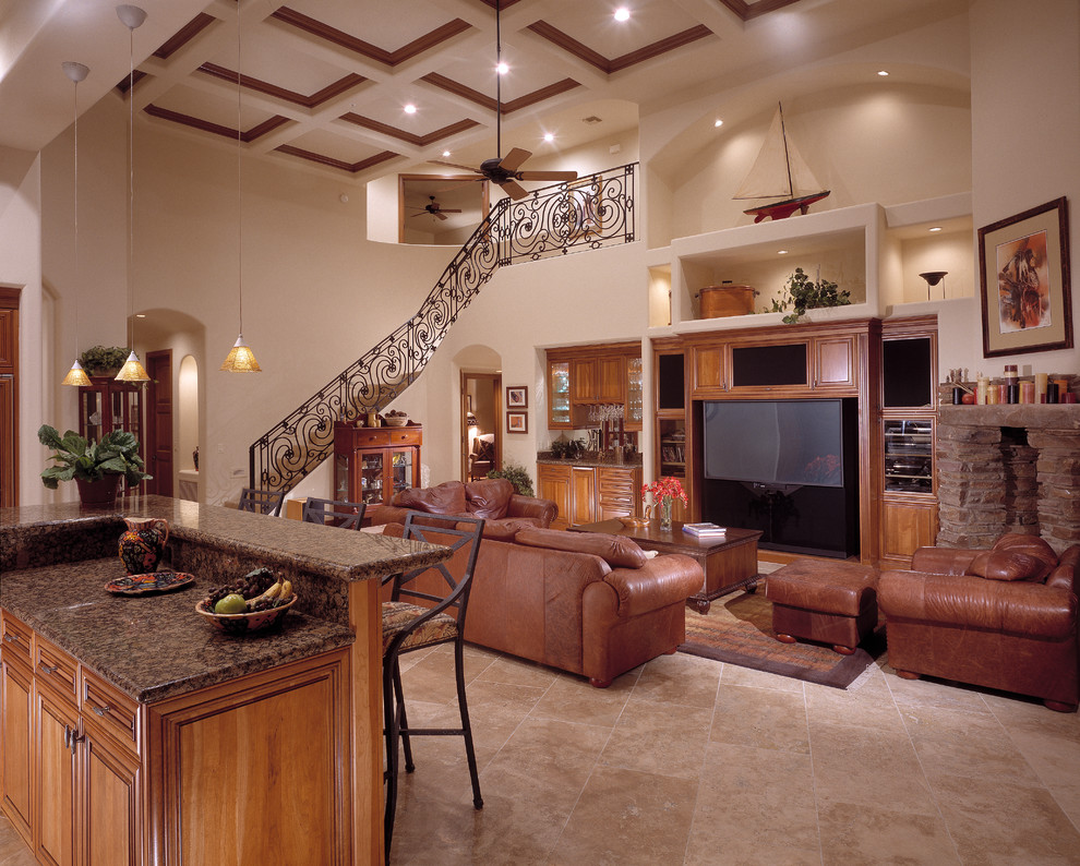 This is an example of a mid-sized transitional open concept family room in Phoenix with beige walls, porcelain floors, a standard fireplace, a stone fireplace surround, a built-in media wall and beige floor.