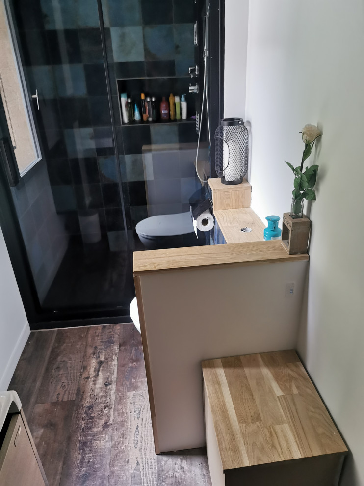 Example of a small minimalist 3/4 white tile and ceramic tile medium tone wood floor and single-sink bathroom design in Paris with light wood cabinets, a wall-mount toilet, white walls, an undermount sink, white countertops and a floating vanity