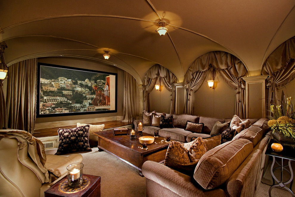 Photo of a mediterranean enclosed home theatre in Other with carpet, a projector screen and brown walls.