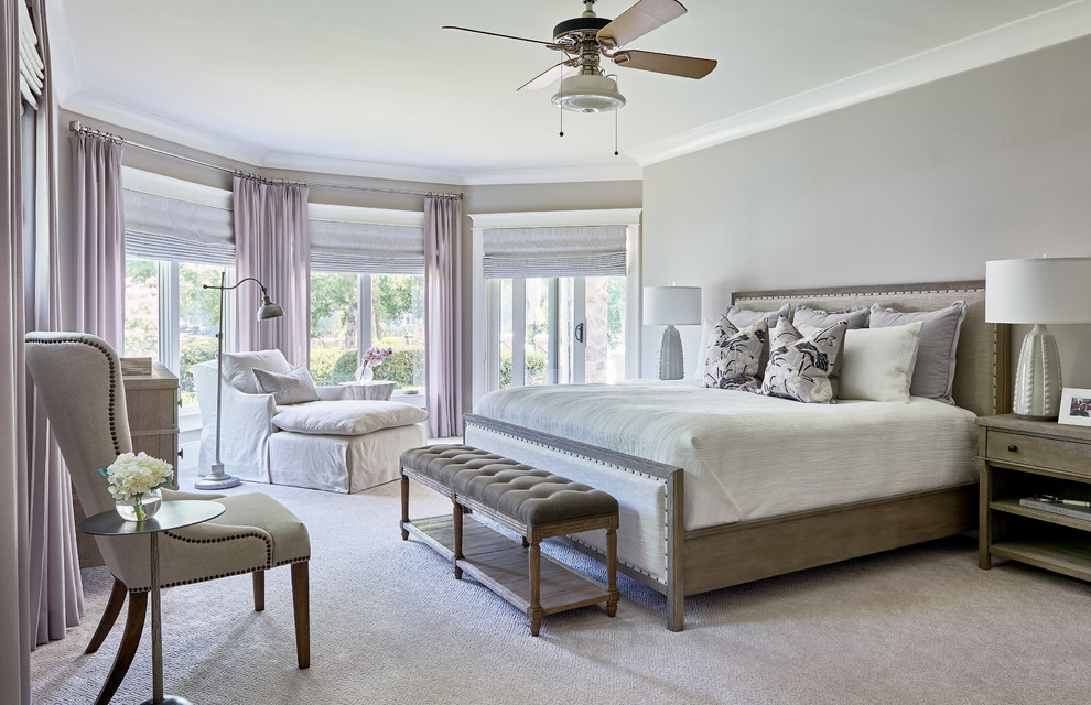 Photo of a beach style bedroom in Charlotte.