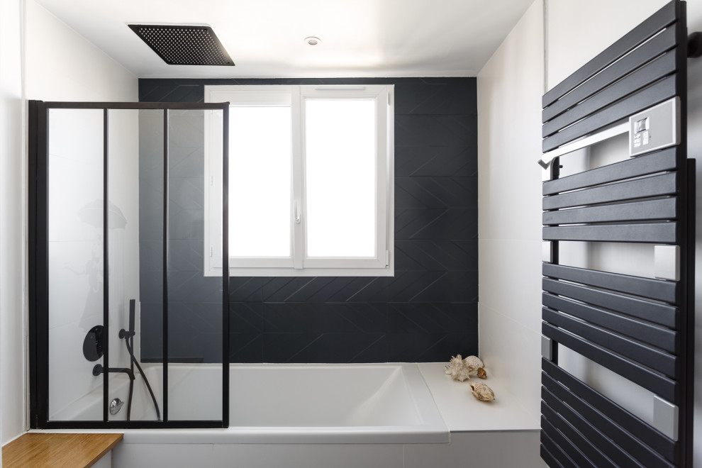 Large contemporary master bathroom in Paris with flat-panel cabinets, brown cabinets, an alcove tub, a shower/bathtub combo, black tile, ceramic tile, white walls, ceramic floors, a vessel sink, wood benchtops, grey floor, a hinged shower door, brown benchtops, a single vanity and a floating vanity.