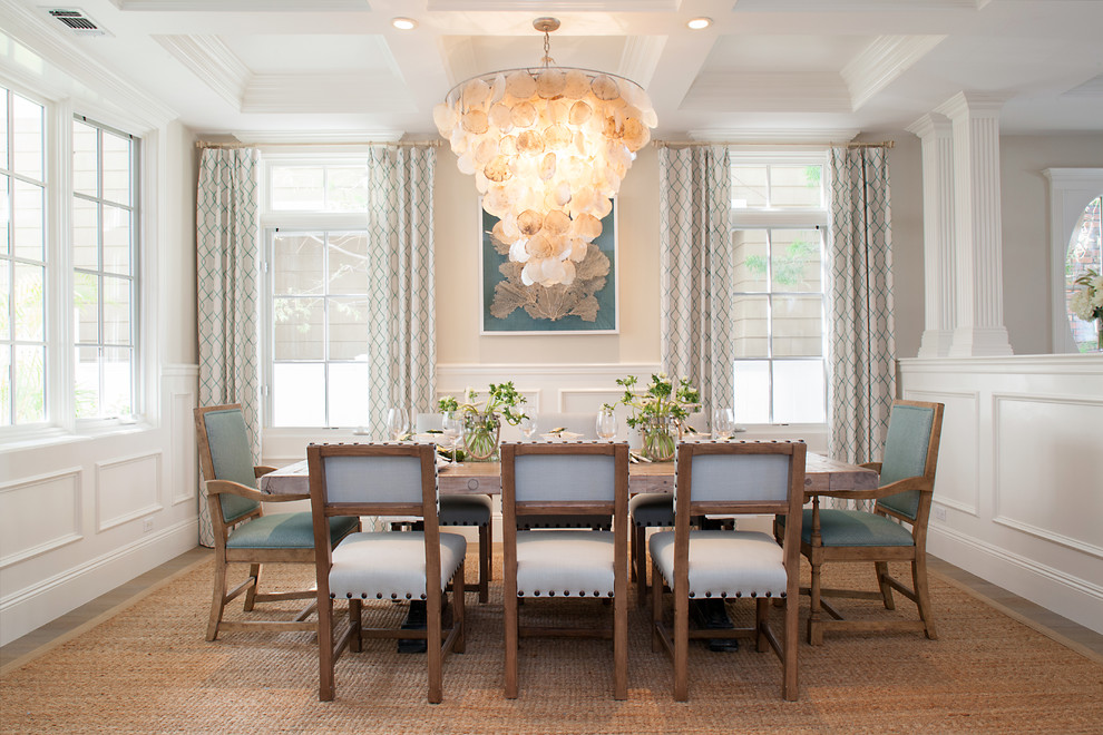 Inspiration for a mid-sized beach style dining room in Orange County with beige walls and no fireplace.