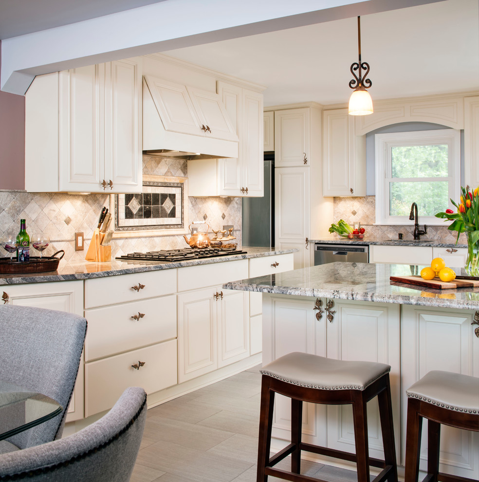 Inspiration for a traditional eat-in kitchen in DC Metro with raised-panel cabinets, white cabinets and beige splashback.