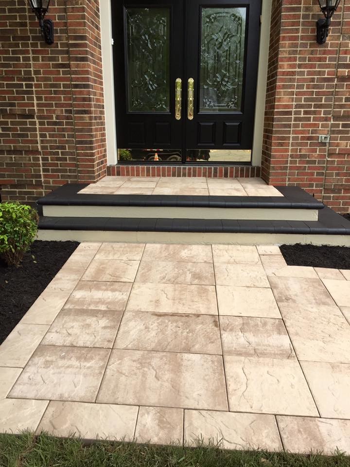 Mid-sized modern front yard partial sun formal garden in DC Metro with a garden path and concrete pavers.