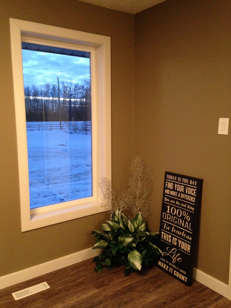 Transitional home design photo in Edmonton