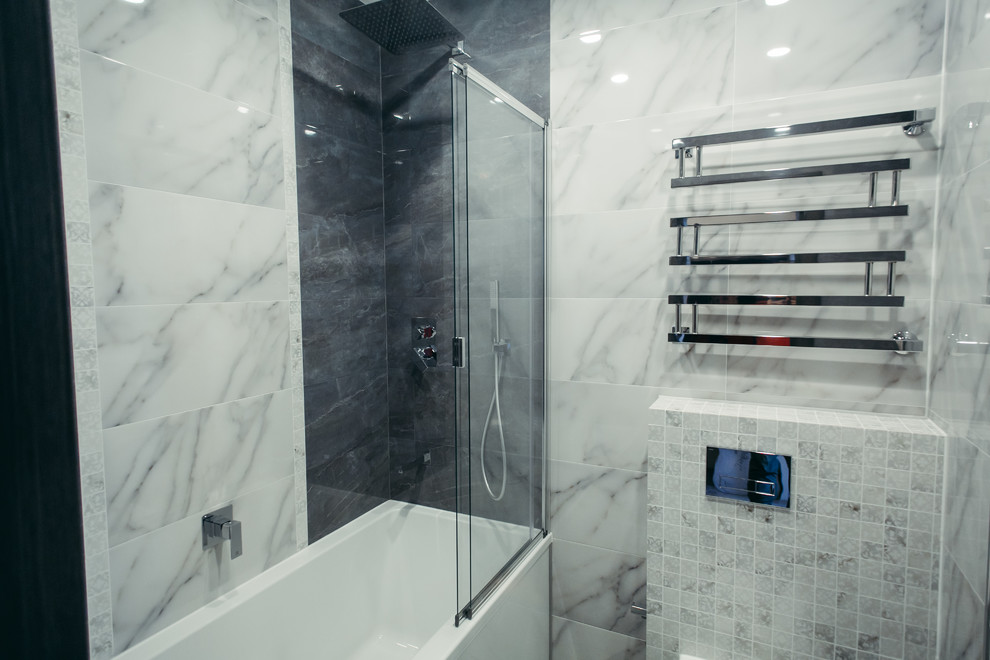 Inspiration for a mid-sized contemporary master bathroom in Other with flat-panel cabinets, white cabinets, a wall-mount toilet, black and white tile, ceramic tile, grey walls, porcelain floors, a wall-mount sink, solid surface benchtops, grey floor, a shower curtain and white benchtops.
