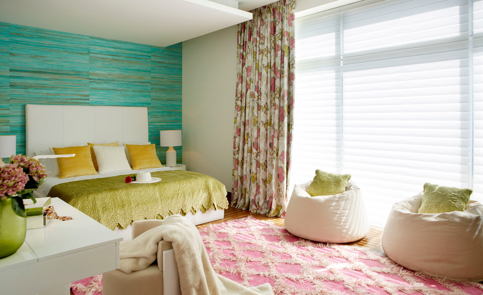 Transitional guest bedroom photo with green walls and no fireplace
