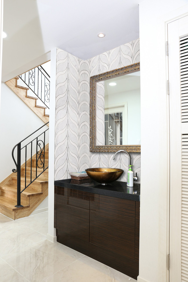 Inspiration for a small transitional hallway in New York with white walls, marble floors and beige floor.