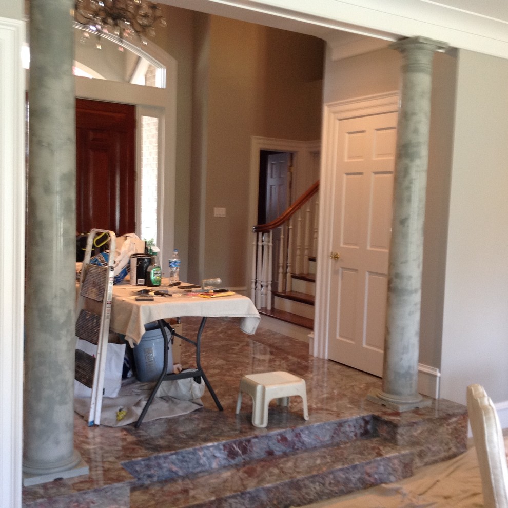 Entryway - transitional marble floor entryway idea