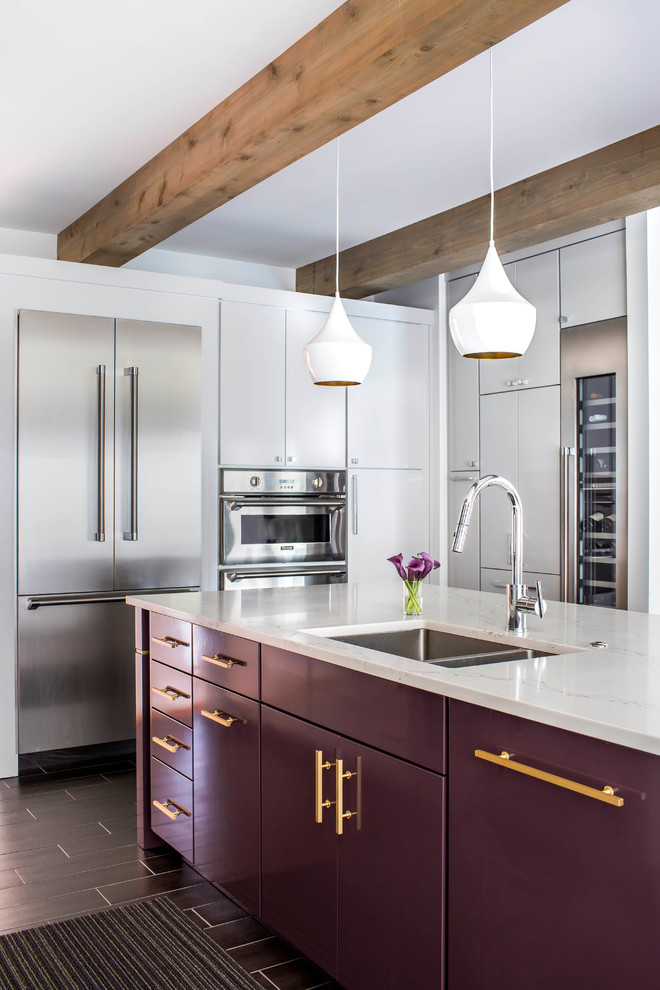 Large trendy ceramic tile kitchen photo with marble backsplash and an island