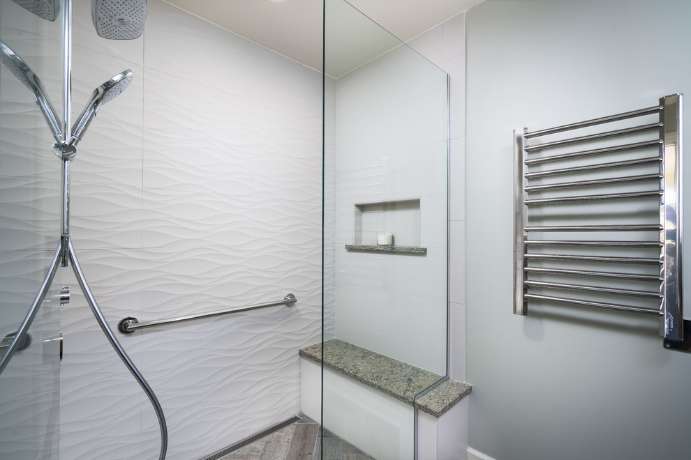 Inspiration for a mid-sized contemporary master bathroom in Columbus with a curbless shower, white tile, porcelain tile, a vessel sink, quartzite benchtops, a hinged shower door and grey walls.