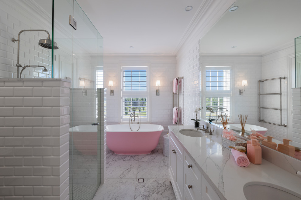 Large traditional kids bathroom in Brisbane with shaker cabinets, white cabinets, a freestanding tub, a double shower, white tile, marble, marble floors, an undermount sink, marble benchtops, grey floor, white benchtops, a double vanity and a built-in vanity.