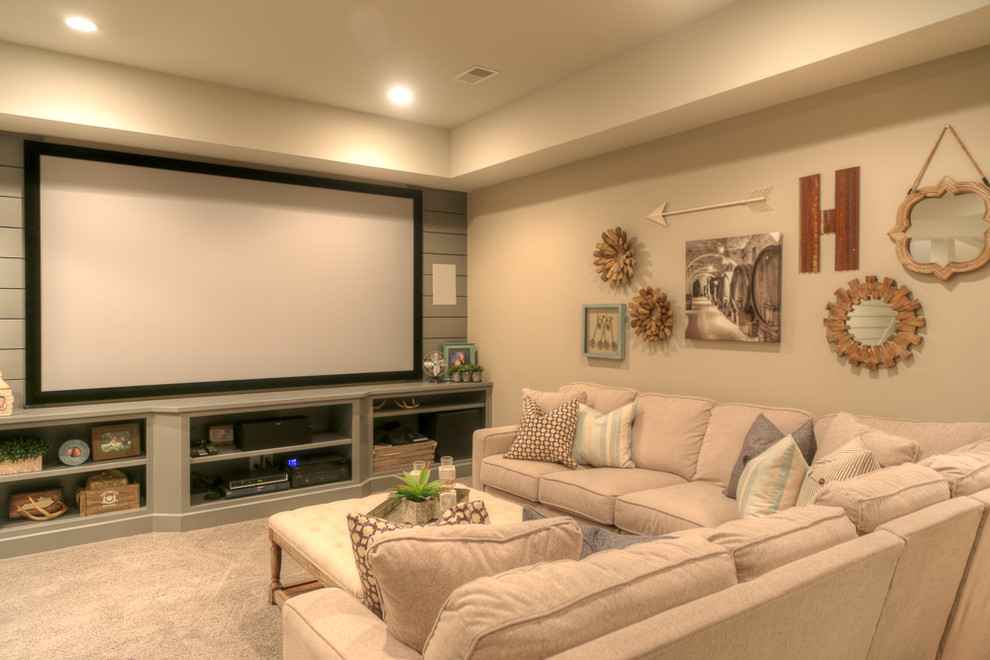 Photo of a beach style family room in Louisville with beige walls, carpet and grey floor.
