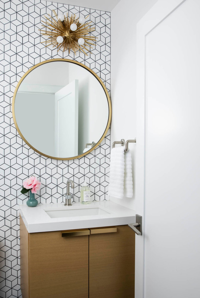 Photo of a contemporary powder room in San Francisco with flat-panel cabinets, medium wood cabinets, white tile, mosaic tile, white walls, an undermount sink, white benchtops and a built-in vanity.