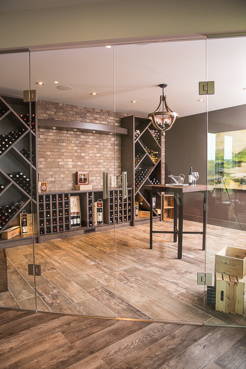Example of a trendy wine cellar design in Calgary