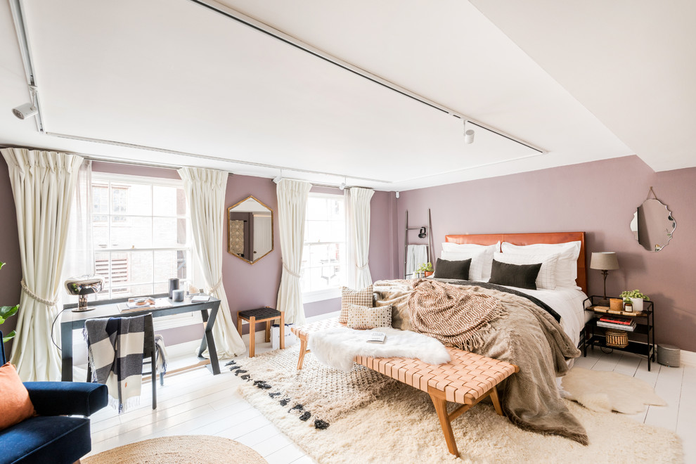 Design ideas for a scandinavian master bedroom in London with purple walls, painted wood floors, no fireplace and white floor.