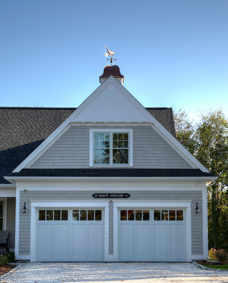 Example of a classic attached two-car garage design in Boston