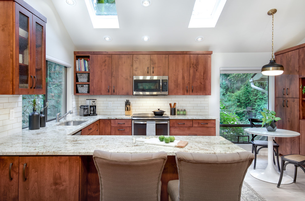 Example of a transitional kitchen design in Seattle