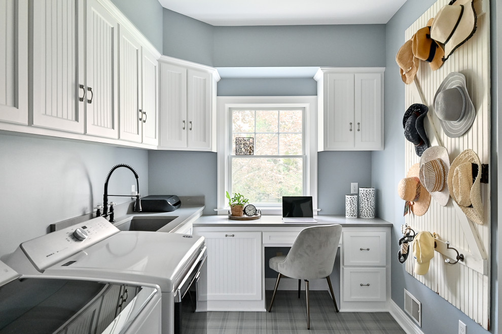 Design ideas for a small classic l-shaped utility room in Milwaukee with a submerged sink, recessed-panel cabinets, white cabinets, quartz worktops, blue walls, ceramic flooring, a side by side washer and dryer, grey floors and grey worktops.