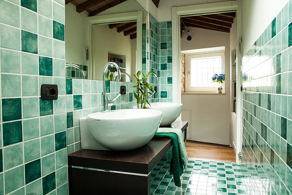 This is an example of a mid-sized contemporary bathroom in Venice.