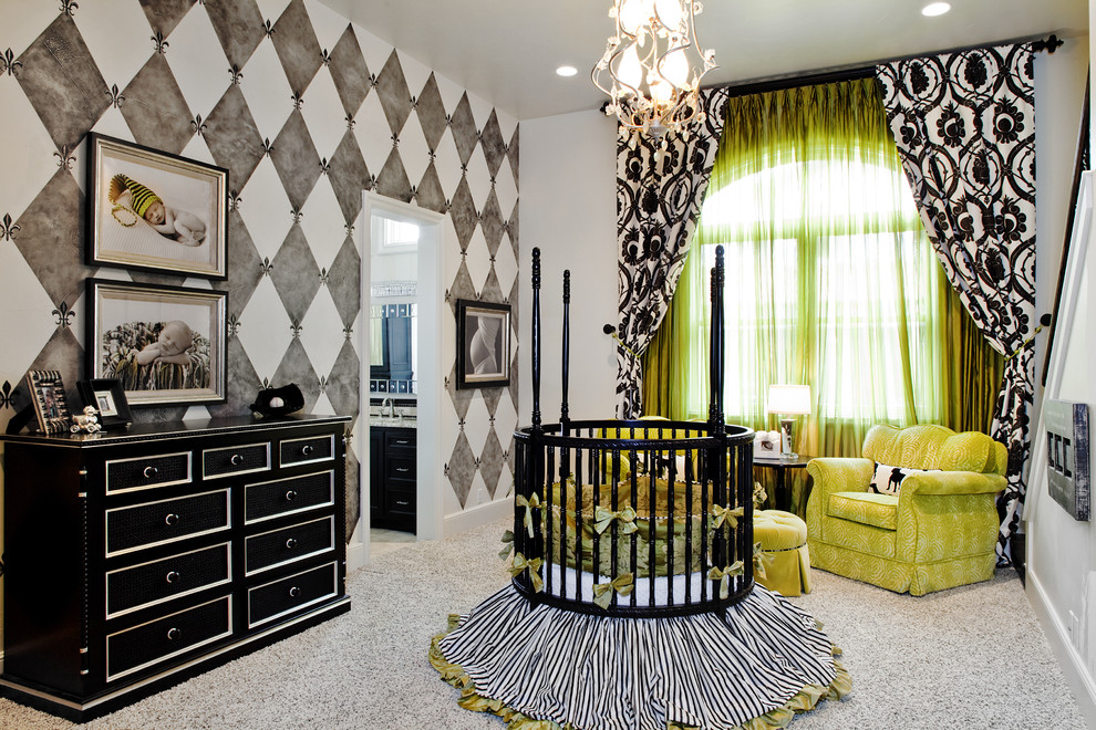 This is an example of a traditional gender-neutral nursery in Austin with multi-coloured walls and carpet.