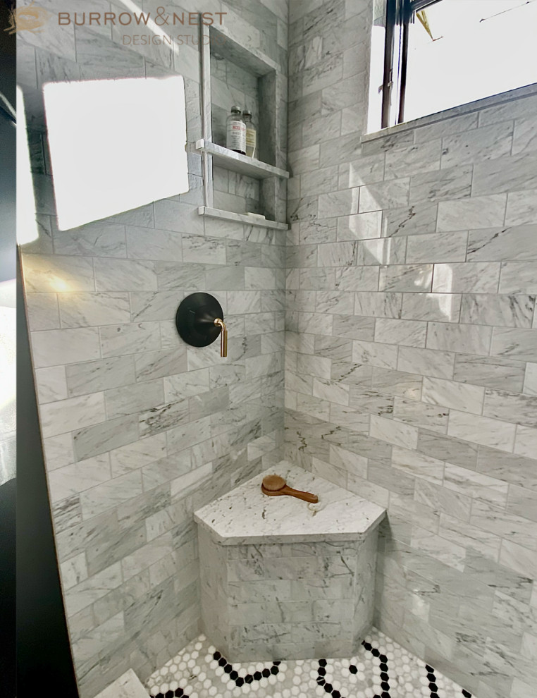 Photo of a medium sized classic bathroom in Providence with flat-panel cabinets, black cabinets, a walk-in shower, a two-piece toilet, black tiles, marble tiles, black walls, marble flooring, a submerged sink, marble worktops, multi-coloured floors, an open shower, white worktops, a shower bench, a single sink, a freestanding vanity unit and panelled walls.