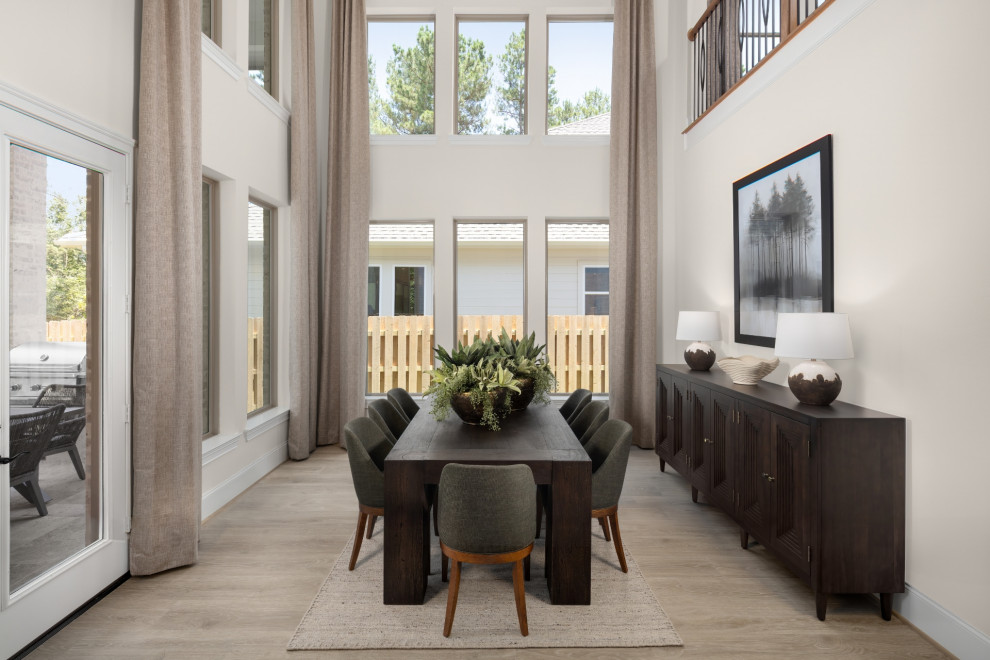 Example of a transitional dining room design in Houston