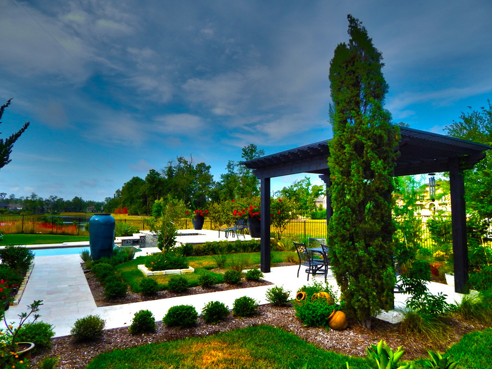 Photo of a transitional landscaping in Houston.