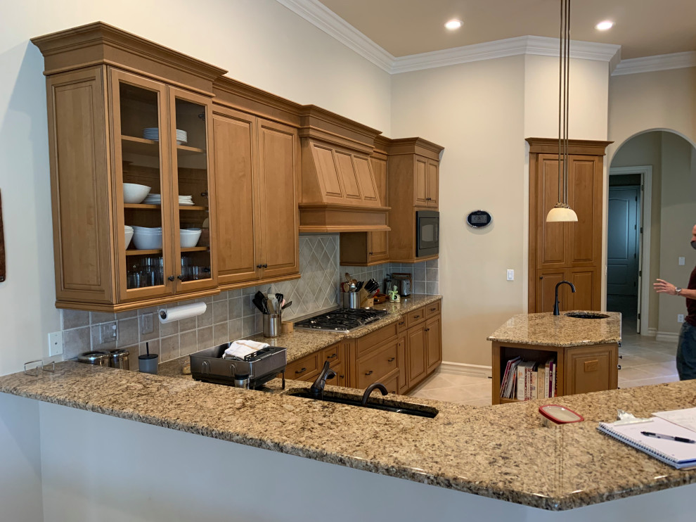 Example of a transitional kitchen design in Miami