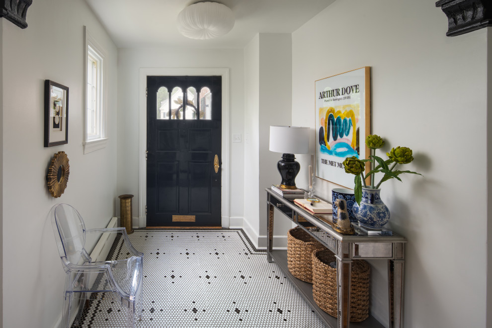 Historic Homeland Full Home Remodel - Example of a transitional multicolored floor foyer design in Baltimore with white walls and a black front door