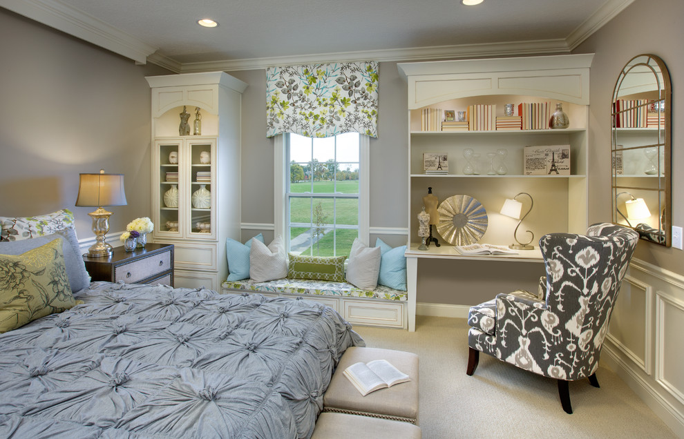 Inspiration for a transitional bedroom in Columbus with beige walls and carpet.