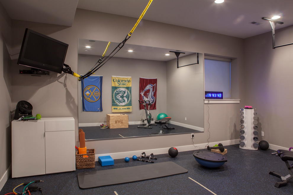 Photo of a small contemporary home weight room in Denver with grey walls.