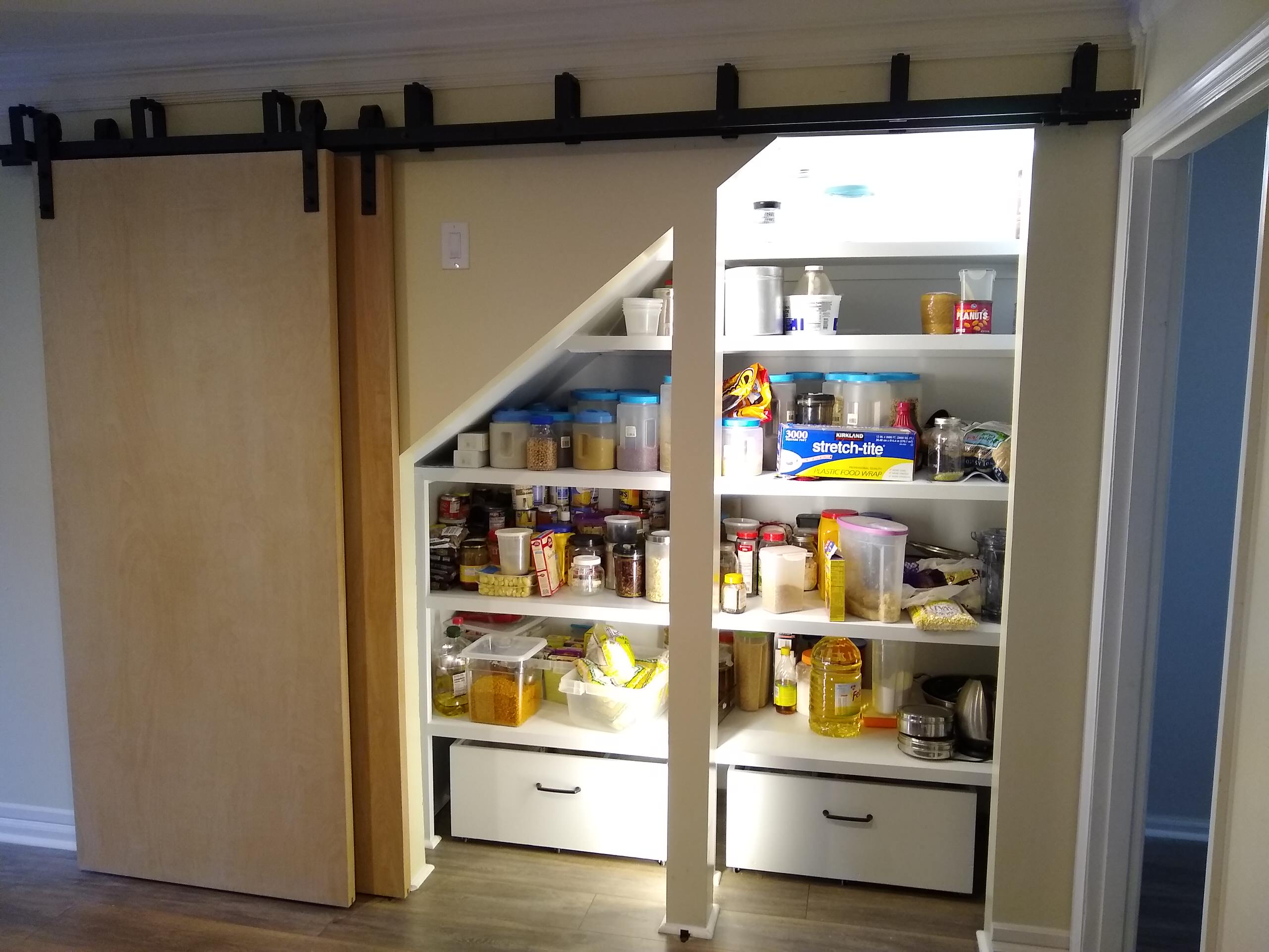 Build Closet with Sliding Barn Doors Under Stairway