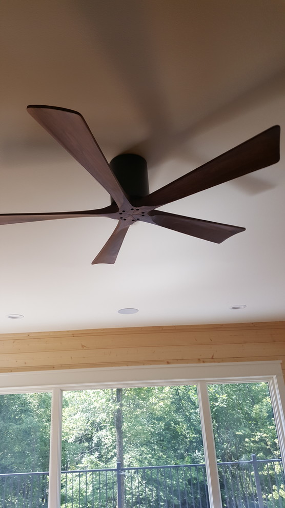 Example of a transitional home design design in Cedar Rapids