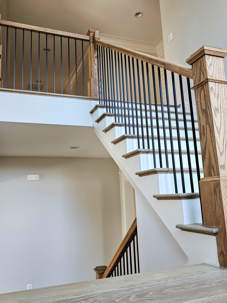 Small modern wood u-shaped mixed railing staircase in DC Metro with wood risers.