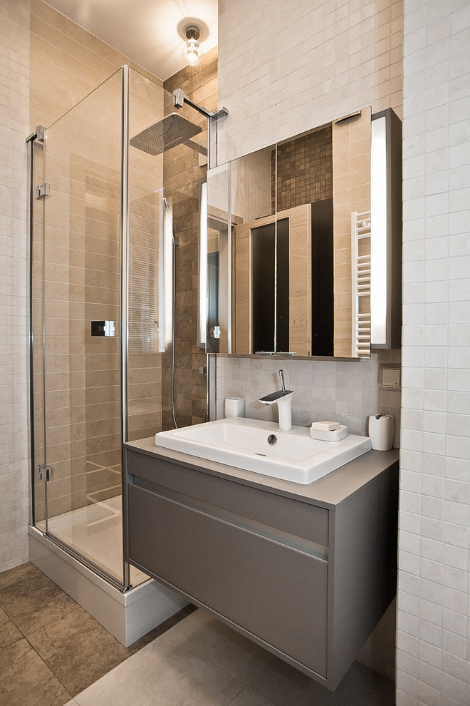 Design ideas for a small contemporary 3/4 bathroom in Moscow with flat-panel cabinets, a corner shower, a wall-mount toilet, beige tile, beige walls, a hinged shower door, beige cabinets, an alcove tub and beige floor.