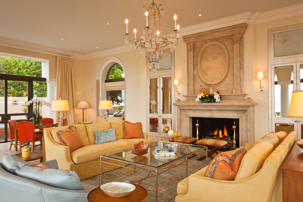 Inspiration for a large traditional formal open concept living room in San Francisco with beige walls, a standard fireplace, a stone fireplace surround, no tv, travertine floors and beige floor.