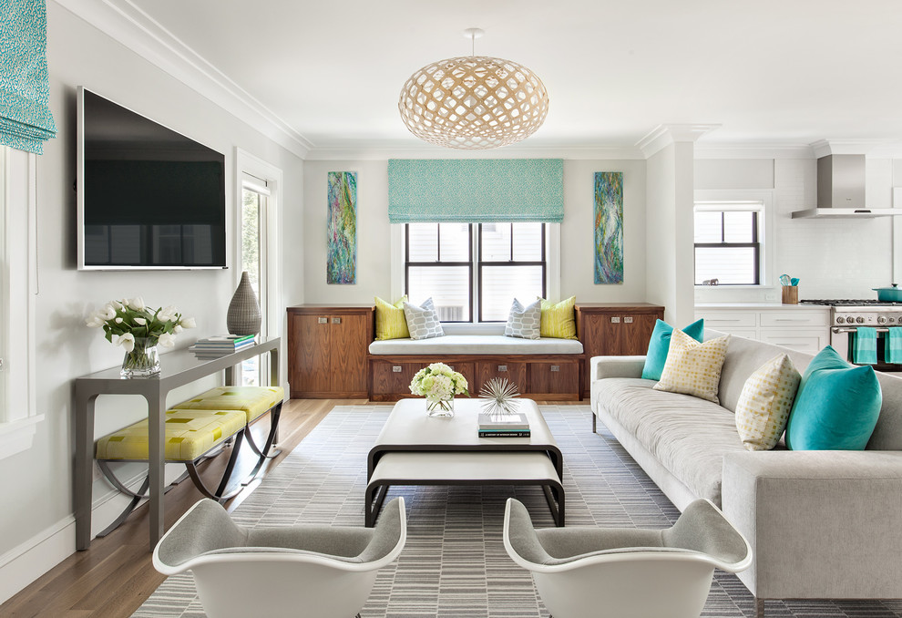 Inspiration for a transitional open concept living room in New York with grey walls and a wall-mounted tv.