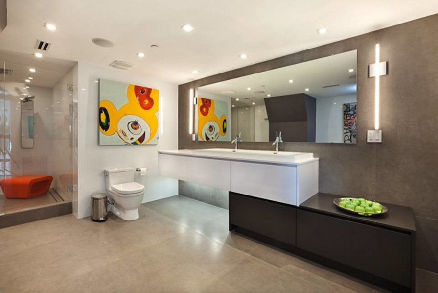Mid-sized modern master bathroom in Miami with flat-panel cabinets, white cabinets, an alcove shower, multi-coloured walls, concrete floors, a vessel sink and solid surface benchtops.