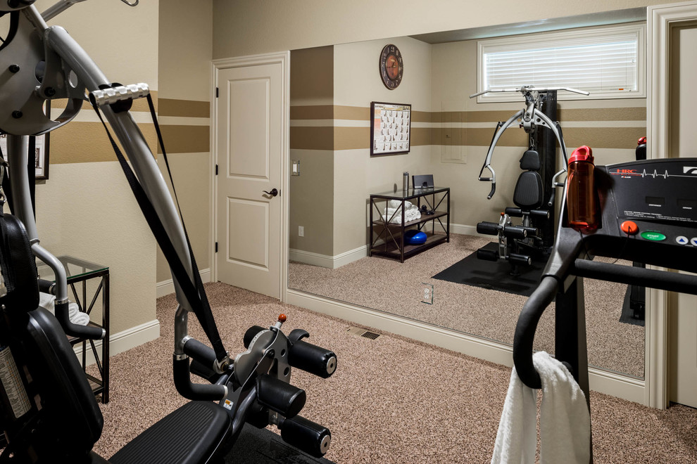 Small transitional multipurpose gym in Portland with beige walls and carpet.