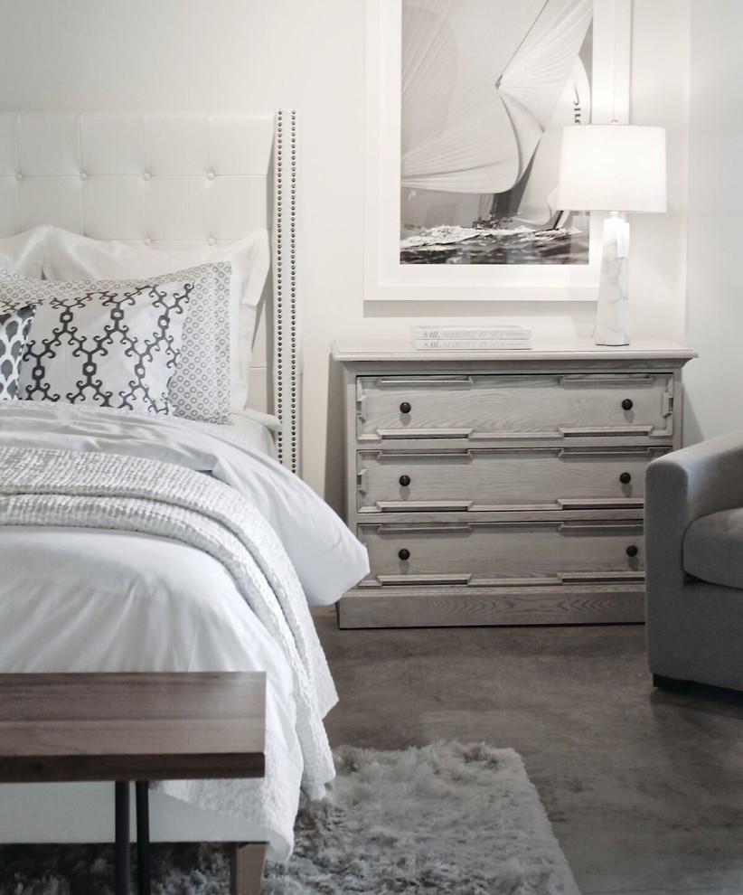 Bedroom - mid-sized transitional master concrete floor and gray floor bedroom idea in Orlando with white walls and no fireplace