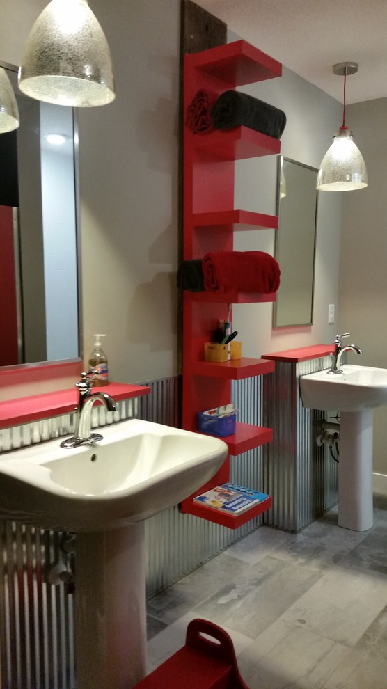 This is an example of a country kids bathroom in Minneapolis with red cabinets, an open shower, a one-piece toilet, gray tile, metal tile, grey walls, ceramic floors, a pedestal sink and laminate benchtops.