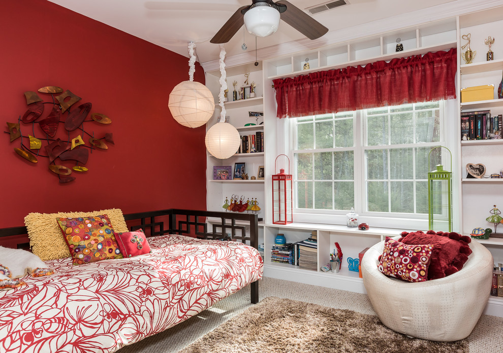 Design ideas for a mid-sized transitional guest bedroom in Boston with red walls, carpet and no fireplace.