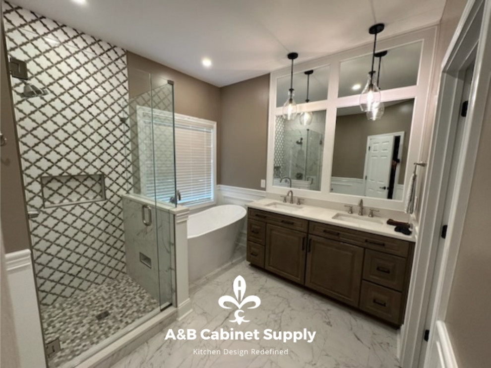 Mid-sized transitional master cement tile floor, multicolored floor and double-sink freestanding bathtub photo with raised-panel cabinets, medium tone wood cabinets, beige walls, an undermount sink, quartz countertops, white countertops and a built-in vanity