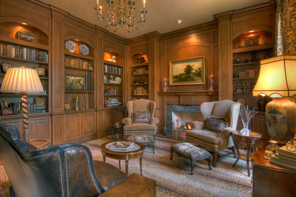 Inspiration for a traditional family room in Jacksonville with a library, carpet and a standard fireplace.