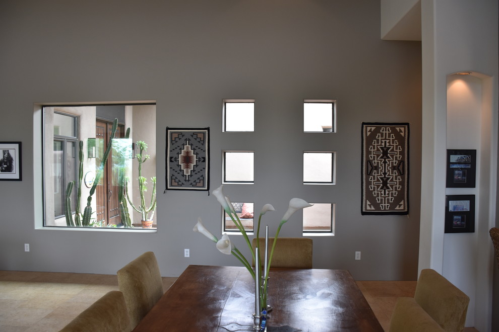 Great room - mid-sized transitional travertine floor and beige floor great room idea in Phoenix with gray walls and no fireplace